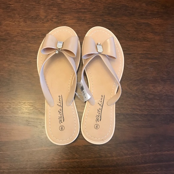 white line flip flops